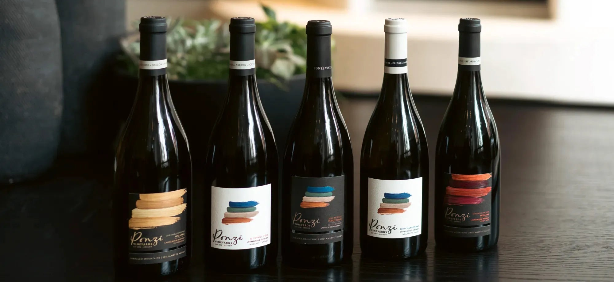 5 bottles of Ponzi Vineyards Pinot Noir sitting on a table
